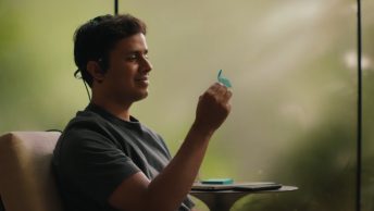 Arnav Kapur, AlterEgo's creator, demonstrates the silent speech interface in a live demo, showing how the wearable device enables communication without audible speech or visible movement.