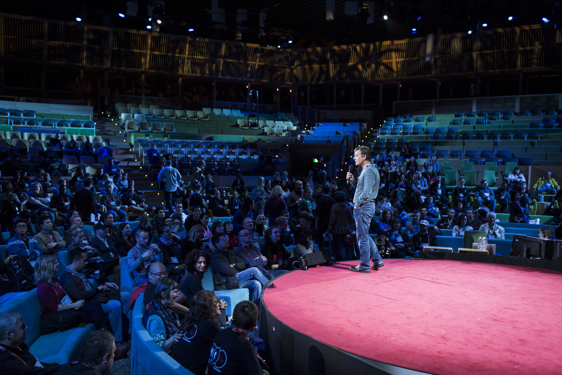 Chris Anderson speaking on the TED2015 stage in front of large projection screens.